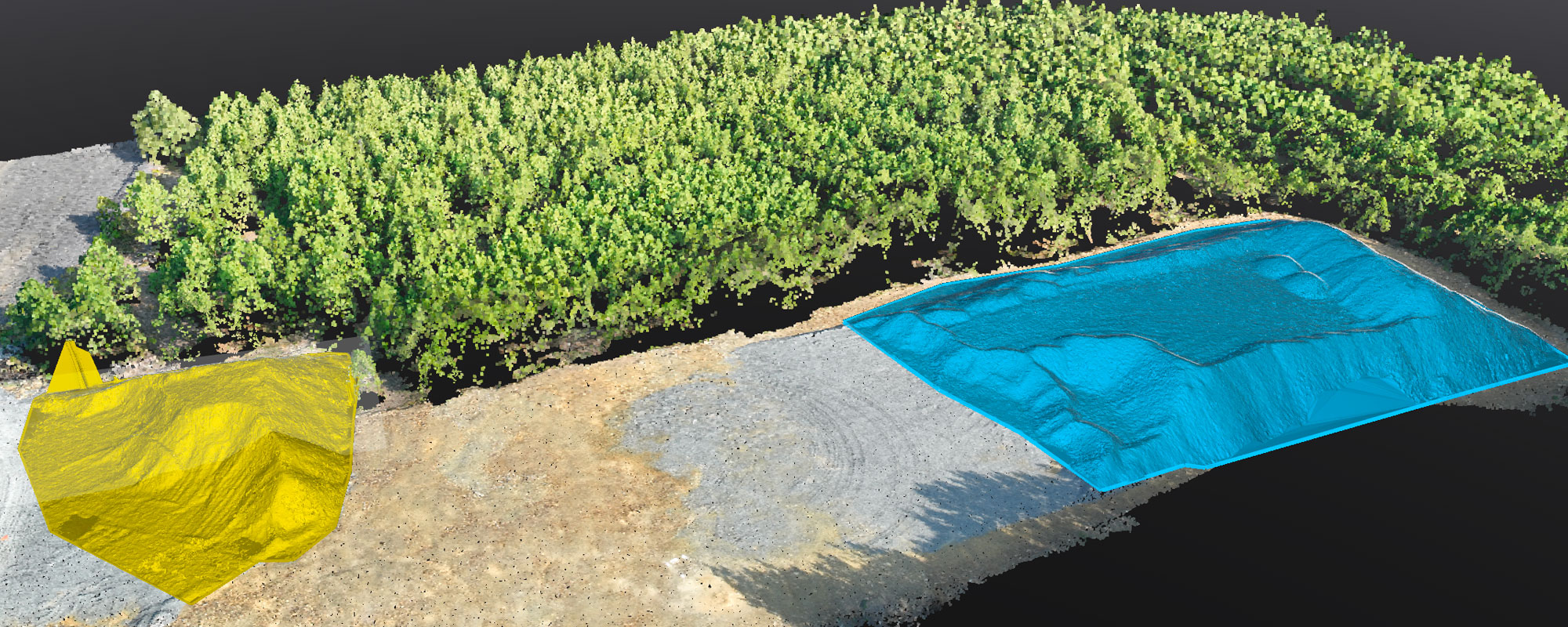 Construction Site With Piles of Fill Material Highlighted in Yellow and Blue